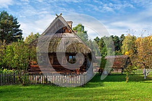 Rural farmstead ancient wooden house Rumsiskes Lithuania photo