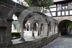 Arch wall of a romanesque cloister photo