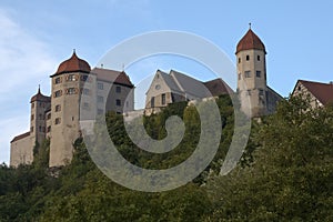 View of castle and forest on a sunny day photo