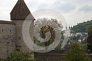 Fortress Marienberg corner tower with views of palace in rural setting photo