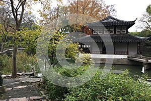 Autumn scenery at ancient Chinese garden in Suzhou