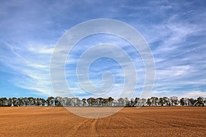 Autumn scenery. The field after harvesting in sunny day.Czech Republic