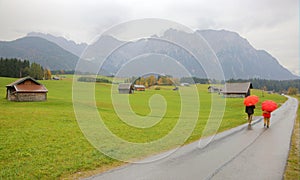 Autumn scenery of a ranch farmland in a foggy morning near Mittenwald