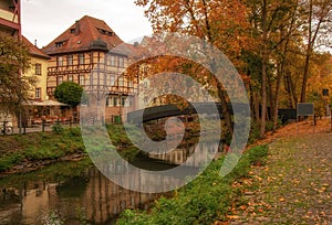 Autumn scenery of Regnitz river in Bamberg, Germany. UNESCO World Heritage Site.