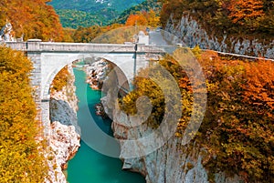 Autumn scenery of Soca river and Napoleon`s bridge near Kobarid, Slovenia