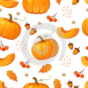 Autumn seamless pattern with pumpkins, acorns, berries, and yellow leaves photo