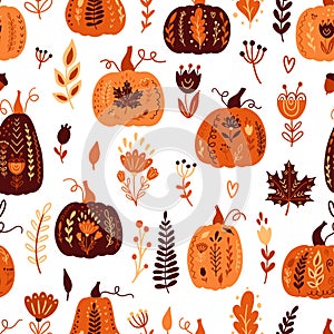 Autumn seamless pattern with pumpkins and floral elements.