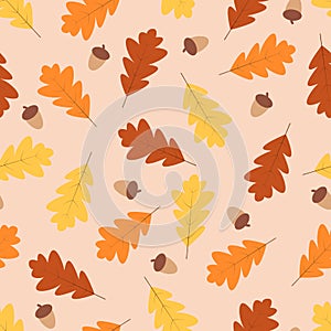 Autumn seamless pattern, yellow and red oak leaves and acorns fall in autumn.