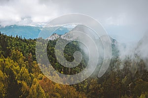 Autumn season aerial view forest and mountains foggy landscape Caucasus mountains