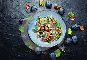 Autumn seasonal salad with plums and figs