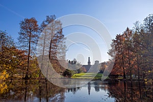 Autumn in Sempione Park with Sforzesco castle on the background in Milan, Italy