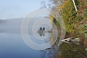 Autumn Shoreline and Dock on a Misty Morning