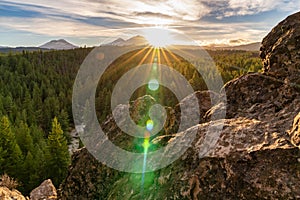 The Sun Sets Over Three Sisters Mountains In Bend Oregon photo