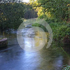 Autumn sunrise on the River Itchen - a famous chalk bed stream renowned for fly fishing - between Ovington and Itchen Abbas in