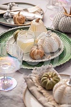 Autumn table setting with pumpkins. Thanksgiving holiday dinner and fall decoration