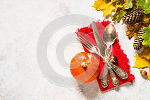 Autumn table setting top view at white table.