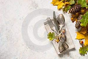 Autumn table setting top view at white table.