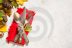 Autumn table setting top view at white table.
