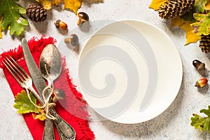 Autumn table setting top view at white table.