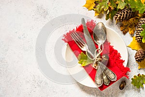 Autumn table setting top view at white table.