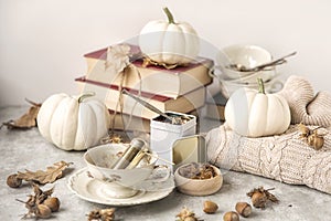 Autumn tea party. Close - up of a Cup of sugar crystals. The table is set and tea. The background is out of focus