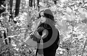 Autumn teenage girl. Portrait of beautiful young teen girl walking outdoors in autumn.