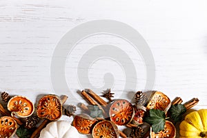 Autumn thanksgiving background with fancy pumpkins and dried fruits