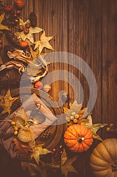 Autumn and Thanksgiving background with pumpkins and autumn leaves