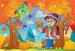 Autumn theme with girl and kite