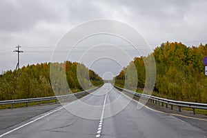 Autumn track on the border of the Khanty-Mansiysk Autonomous Okrug and the Sverdlovsk Region in Russia