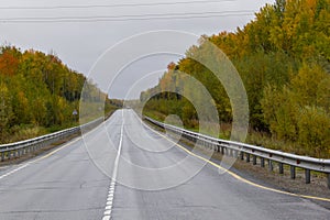 Autumn track on the border of the Khanty-Mansiysk Autonomous Okrug and the Sverdlovsk Region in Russia