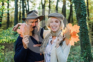 Autumn travels. Autumn fashion portrait of couple with autumnal mood. Romantic couple. Outdoor Autumn atmospheric