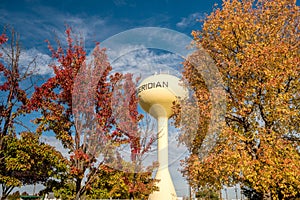 Autumn trees and the Meridian Idaho water tower