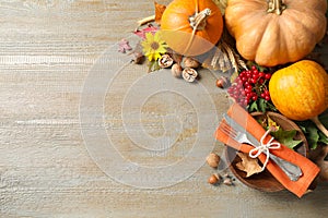 Autumn vegetables and cutlery on background, flat lay with space for text. Happy Thanksgiving day