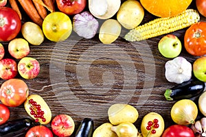 Autumn vegetables harvest, raw healthy organic food on wooden background