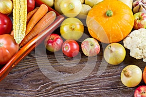 Autumn vegetables Thanksgiving harvest, raw healthy organic food on wooden background