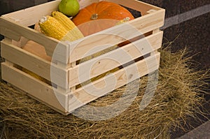 Autumn vegetables in wooden box