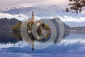 Autumn view of the historical church on the island in Lake Bled