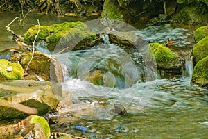 Autumn View of a Peaceful Mountain Waterfall