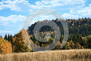 Autumn view on peak Stolowe Mountains from Pasterka village in Poland. Szczeliniec