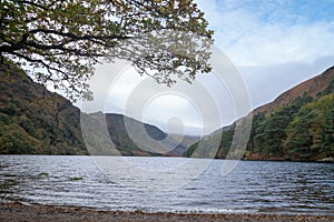 Autumn in the Wicklow Mountains. Glendalough Upper lake, afternoon, calm water, blue sky