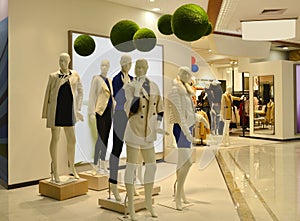 Autumn winter fashion Mannequins  in fashion clothing mall, green and healthy life