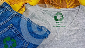 autumn winter jumpers recycle clothes symbol recycle sign, on t shirt and jeans