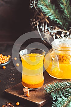 Autumn or winter sea buckthorn drink. Sea Buckthorn tea, selective focus. Still life, food and drink, seasonal and holidays