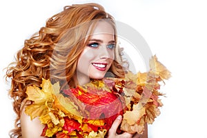 Autumn woman with bright leaves.