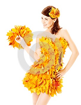 Autumn woman in fashion dress of maple leaves over white