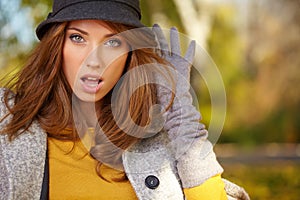 Autumn woman in golden park