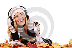 Autumn woman listening music