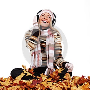 Autumn woman listening music