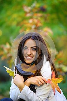 Autumn woman sitting